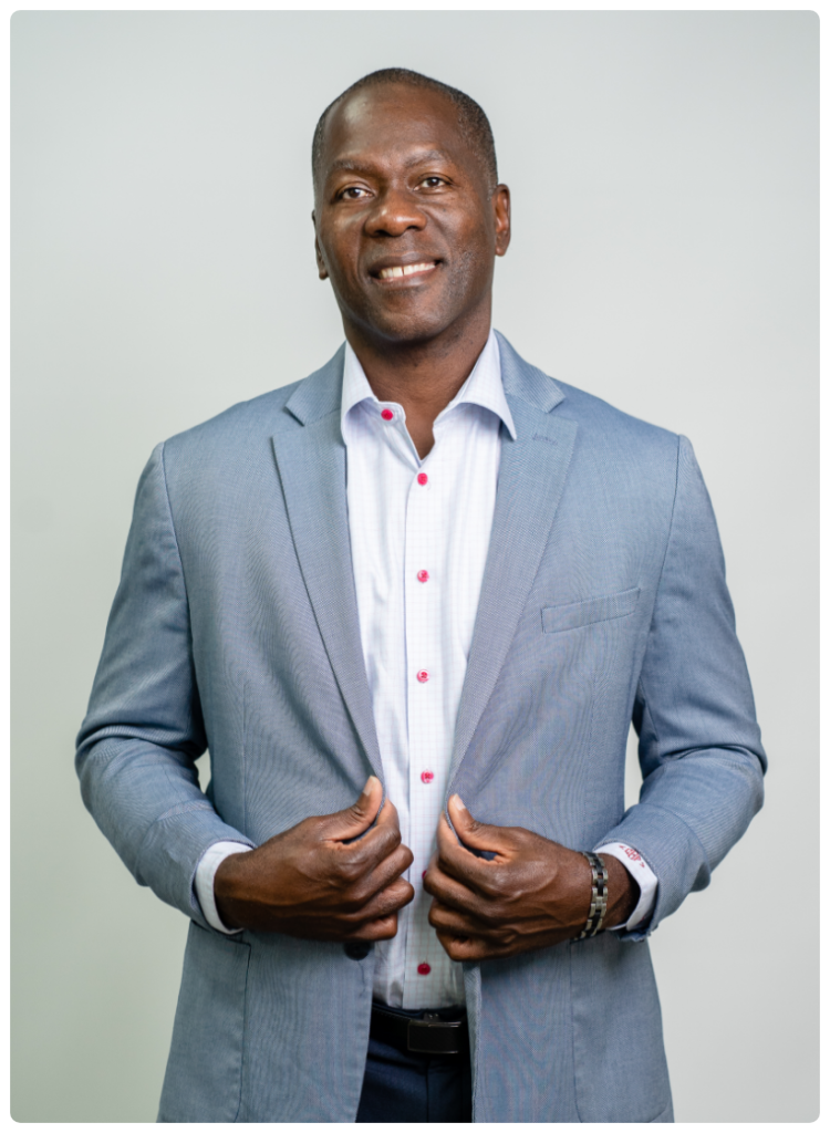 Well-dressed man wearing a suit and white shirt, exuding professionalism and elegance.