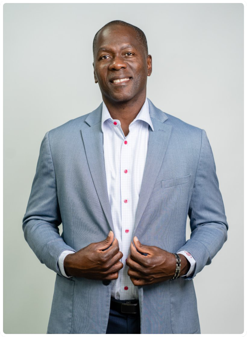 Well-dressed man wearing a suit and white shirt, exuding professionalism and elegance.